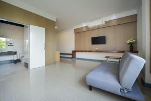 TV a/nebo společenská místnost v ubytování Kaew Samui Resort