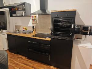 ครัวหรือมุมครัวของ Lüdenscheid Work and Stay 3 Schlafzimmer 6 Betten Küche Bad Innenstadt +30 ภาพ