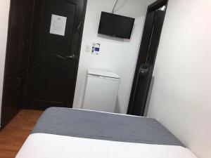 Postel nebo postele na pokoji v ubytování Hotel Castellon Plaza Pereira