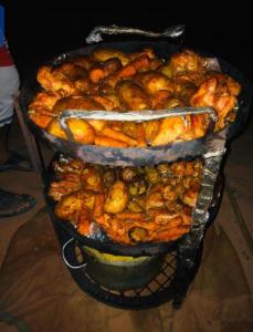 three trays of food sitting on a table at Olivia Rum Luxury Bubbles & Jeep Tours in Wadi Rum