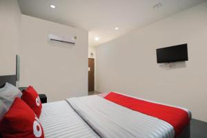 TV a/nebo společenská místnost v ubytování OYO 939 69 Resort