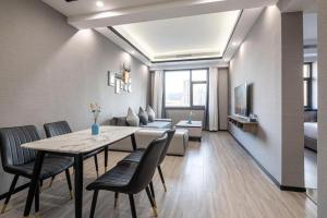 Χώρος καθιστικού στο Xiamen Dongchen Hotel