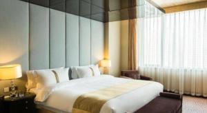 Voodi või voodid majutusasutuse Datong Hotel toas