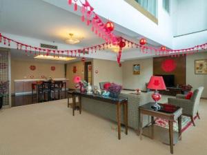 Posezení v ubytování Dongying Blue Horizon Intenational Hotel