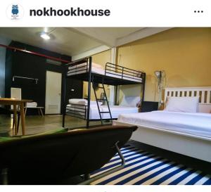 Postel nebo postele na pokoji v ubytování Nokhook House