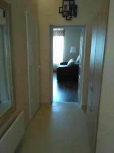 Posteľ alebo postele v izbe v ubytovaní Paradise Apartmanház