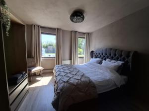 Ένα ή περισσότερα κρεβάτια σε δωμάτιο στο Bed and Breakfast Goeree Overflakkee