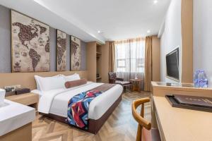 TV a/nebo společenská místnost v ubytování James Joyce Coffetel·Suqian Bus Station