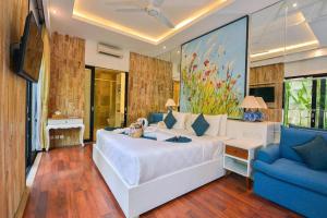 Ένα ή περισσότερα κρεβάτια σε δωμάτιο στο Amara Villa Umalas Bali +96 φωτογραφίες
