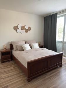 Ένα ή περισσότερα κρεβάτια σε δωμάτιο στο ZENNA Apartment v centre mesta s parkovaním FREE