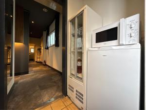 Kjøkken eller kjøkkenkrok på 柏屋旅館アネックス