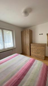Postel nebo postele na pokoji v ubytování Casa Brugnara