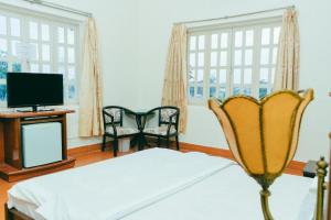 TV a/nebo společenská místnost v ubytování Diamond Resort Bien Hoa