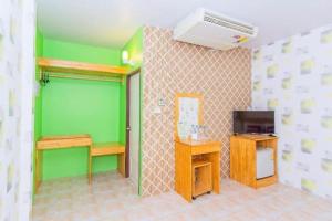 TV a/nebo společenská místnost v ubytování OYO 658 Peamsook​ Resort​