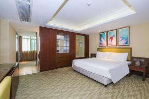 Postel nebo postele na pokoji v ubytování New Regent Hotel + 284 fotografií