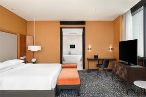 Gulta vai gultas numurā naktsmītnē Park Hyatt Doha, Msheireb Downtown