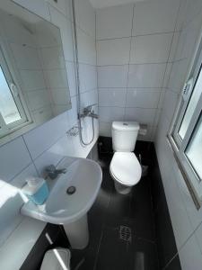 Koupelna v ubytování Hotel Gjika