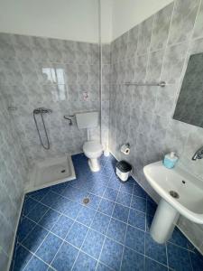 Koupelna v ubytování Hotel Gjika