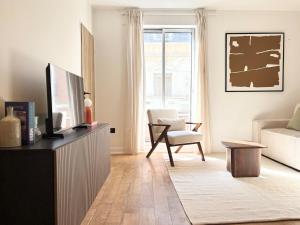 TV a/nebo společenská místnost v ubytování Hypercentre du Touquet - appartement rénové