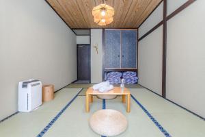 a room with a table and a tv in it at Saint Moritz Ichibankan in Yuzawa +213 photos