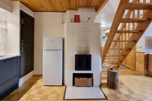 Kuchyň nebo kuchyňský kout v ubytování Kuukkeli Apartments Teerenpesue E 33