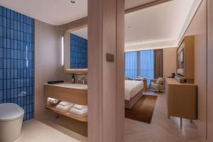 Koupelna v ubytování Lijia Hotel + 272 fotografií