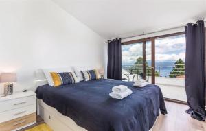 Ένα ή περισσότερα κρεβάτια σε δωμάτιο στο Villa Nino with view - Lovran by Villas Guide +62 φωτογραφίες