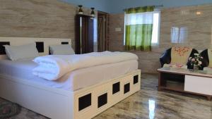 Postel nebo postele na pokoji v ubytování Okaasan Guest House + 7 fotografií