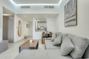 Posezení v ubytování Hala Holiday Homes - Al Hamra Village, RAK