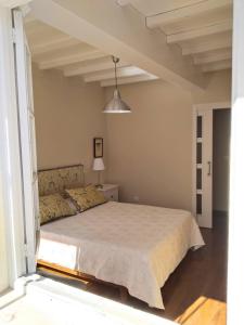 Ένα ή περισσότερα κρεβάτια σε δωμάτιο στο Casa Silandeira