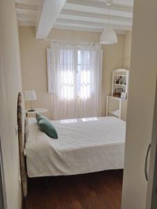 Ένα ή περισσότερα κρεβάτια σε δωμάτιο στο Casa Silandeira