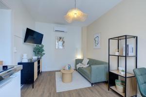 Μια τηλεόραση ή/και κέντρο ψυχαγωγίας στο Central - 800 m Gare - Parking - Climatisé
