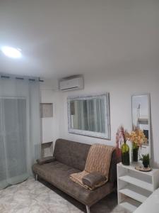 a living room with a couch and a table at Aguadulce Montse in Aguadulce