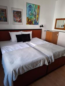 Postel nebo postele na pokoji v ubytování Rooms Bytom
