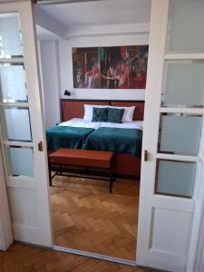 Postel nebo postele na pokoji v ubytování Rooms Bytom