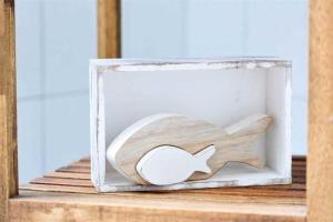 a wooden shark ornament in a wooden box at Wohnung 5 ID 103 in Böhl