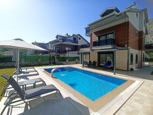 The swimming pool at or close to Villa KayaHan Göcek