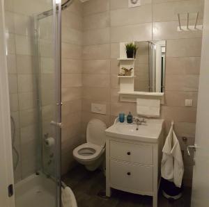 Ванна кімната в Villa Sisa Apartment