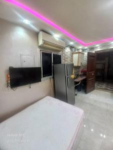 Μια τηλεόραση ή/και κέντρο ψυχαγωγίας στο مدينه الالعاب المائيه المجانيه بالعالمين