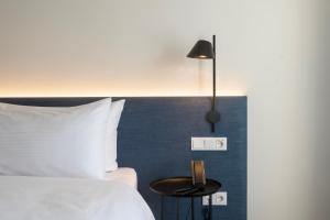 Hampton By Hilton Potsdam Babelsberg客房内的一张或多张床位