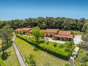 an aerial view of a farm with a building at Residence Erba Di Campo in Livorno