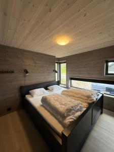 Postel nebo postele na pokoji v ubytování Private Cottage in Sirdal close to Summer Park