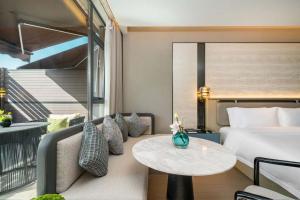 Zona de estar de 上海虹桥荷逸唐酒店北新泾地铁站Shanghai Hongqiao Heyitang Hotel Beixinjing Subway Station Branch
