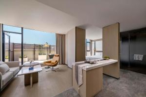 Zona de estar de 上海虹桥荷逸唐酒店北新泾地铁站Shanghai Hongqiao Heyitang Hotel Beixinjing Subway Station Branch