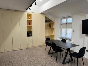 Televízia a/alebo spoločenská miestnosť v ubytovaní Flat in Duomo