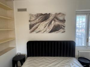 Posteľ alebo postele v izbe v ubytovaní Flat in Duomo