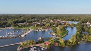 an aerial view of a marina with boats in the water at SJÖTORPS HOSTEL in Sjötorp