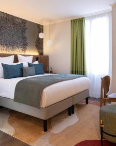 Postel nebo postele na pokoji v ubytování Hotel Grand Villa Suite Near IGI Airport