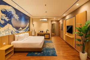 TV a/nebo společenská místnost v ubytování The Bellezza Hotel Suites