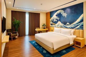 A bed or beds in a room at The Bellezza Hotel Suites